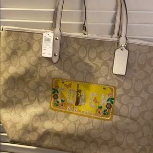 Authentic coach purse never used tags on it.